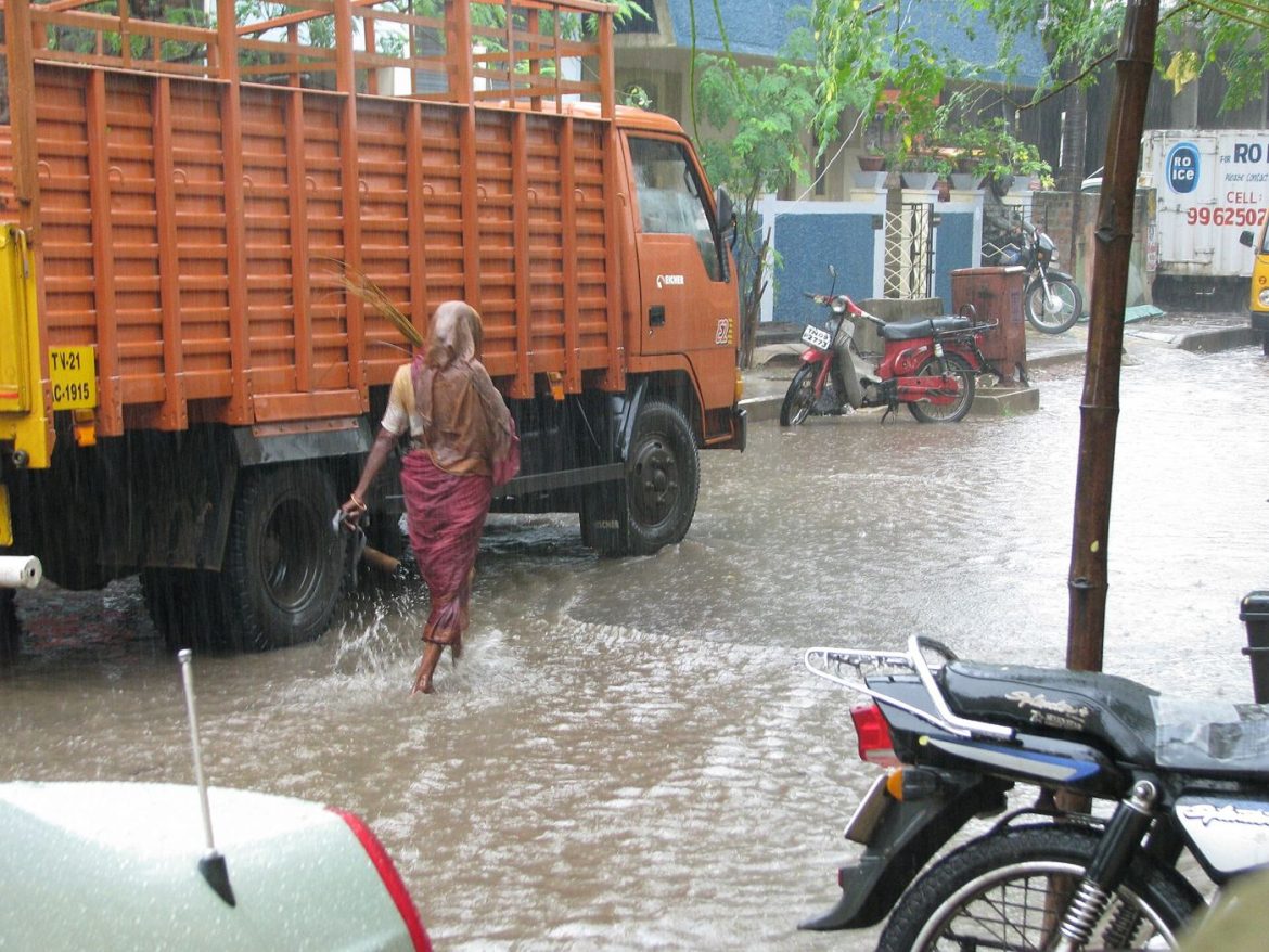Heavy monsoon rain falling on an Indian city street
