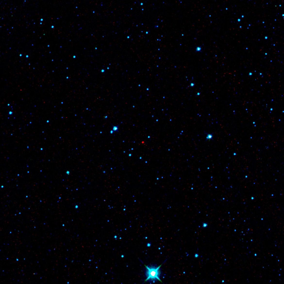 dark rocky asteroid floating against a background of stars