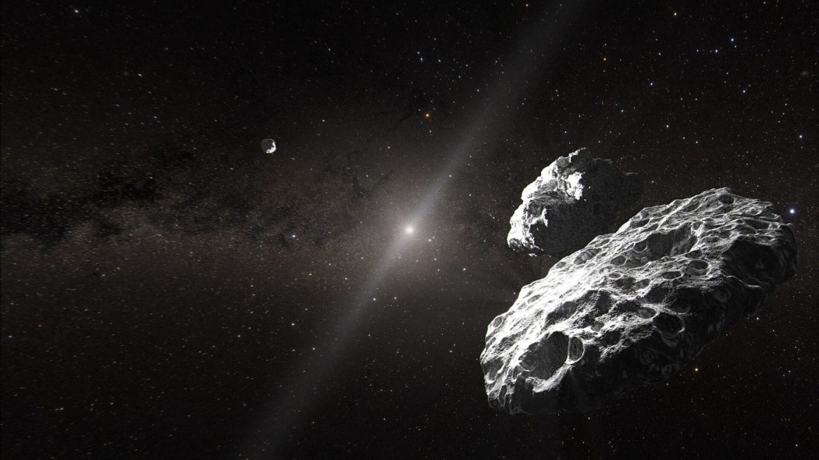 asteroid tumbling against a star field